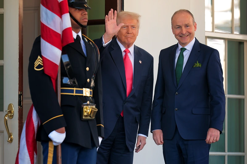 WASHINGTON, DC - MARCH 12: U.S. President Donald Trump (L) greets Irish Taoiseach Micheal Martin at the North Portico of the White House West Wing on March 12, 2025 in Washington, DC. Martin is visiting the United States for the Irish leader's annual St. Patrick's Day visit where he met with Trump ahead of a St. Patrick's Day luncheon with Congressional leaders. (Photo by Chip Somodevilla/Getty Images)