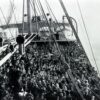 Crowd of men and women immigrants on deck of S.S. Patricia, Edwin Levick, December 1906