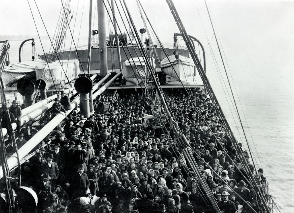 Crowd of men and women immigrants on deck of S.S. Patricia, Edwin Levick, December 1906