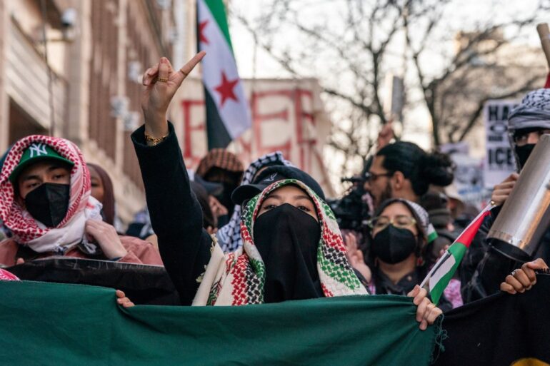 Muslims and others demonstrate outside the main campus of Columbia University to denounce the immigration arrest of Mahmoud Khalil, a pro-Palestinian activist who helped lead protests against Israel at the university, in New York City, U.S., March 14, 2025.