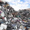 A trash heap of electronic items