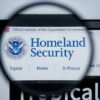 Magnifying glass showing Homeland Security website