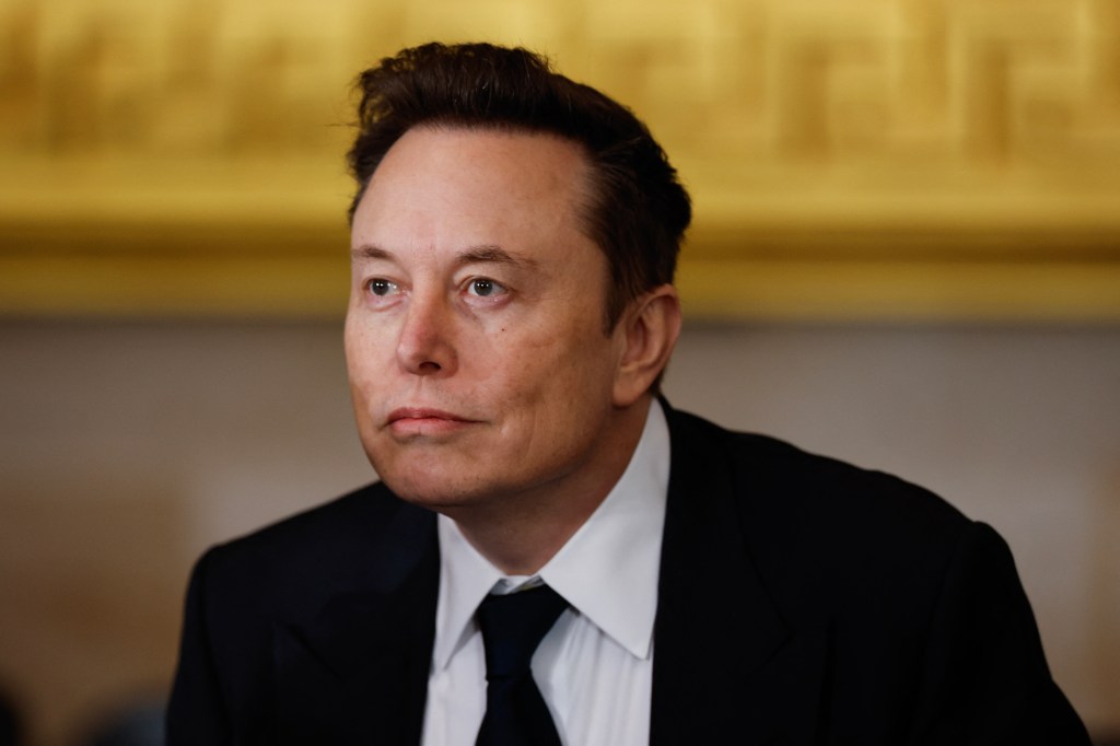 Elon Musk in a suit arriving at the inauguration ceremony for Donald Trump at the US Capitol Rotunda in Washington, DC