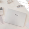 MSI promotional photo of a woman using a Prestige A16 AI+ laptop