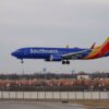 A Southwest Airlines passenger jet lands at Chicago Midway International Airport in Chicago, Illinois, on December 28, 2022. (Photo by KAMIL KRZACZYNSKI / AFP) (Photo by KAMIL KRZACZYNSKI/AFP via Getty Images)