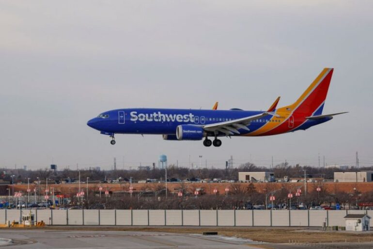 A Southwest Airlines passenger jet lands at Chicago Midway International Airport in Chicago, Illinois, on December 28, 2022. (Photo by KAMIL KRZACZYNSKI / AFP) (Photo by KAMIL KRZACZYNSKI/AFP via Getty Images)