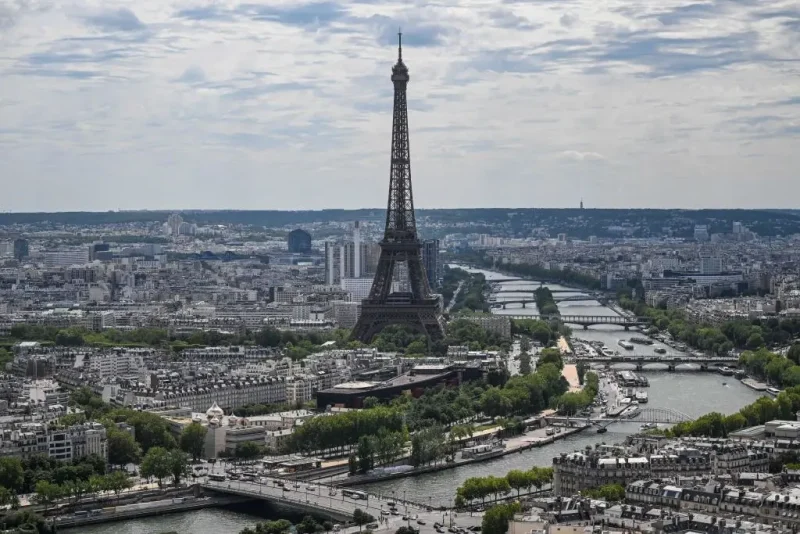 This photograph taken onboard a helicopter shows a view of the Seine river and the Eiffel Tower during a rehearsal, three days ahead of the Bastille Day parade, in Paris on July 11, 2023. (Photo by Emmanuel DUNAND / AFP) (Photo by EMMANUEL DUNAND/AFP via Getty Images)