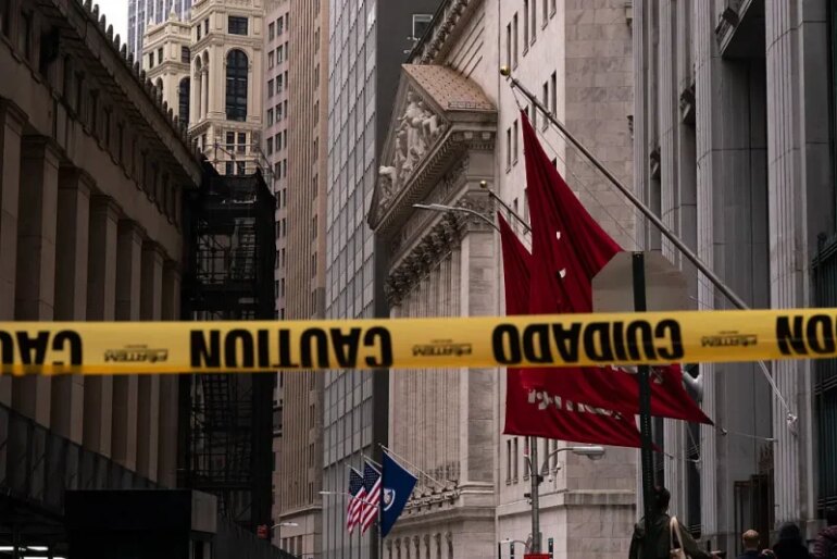 NEW YORK, NEW YORK - APRIL 15: A view of the New York Stock Exchange behind caution tape before morning trading on April 15, 2025 in New York City. U.S. stocks climbed early Tuesday as investors weighed recent updates on President Trump's tariffs, including a possible reprieve for the auto industry and a definitive move toward new duties on semiconductors and pharmaceuticals. (Photo by Adam Gray/Getty Images)