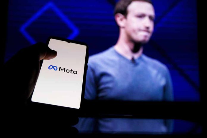 Phone displaying Meta logo in front of presentation