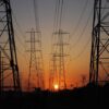 Transmission towers at sunset