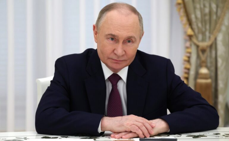 Russian President Vladimir Putin, listens to Akie Abe, the widow of former Japanese Prime Minister Shinzo Abe, during a meeting at the Kremlin, May 29, 2025, in Moscow, Russia.