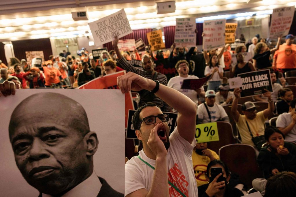 Tenants and housing activists, including Eric Adams and Mary Tudor, protesting against rent increase at Hunter College, New York on June 21, 2023