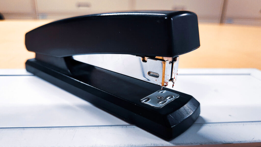 Satire news: stapler not the same since tasting human flesh