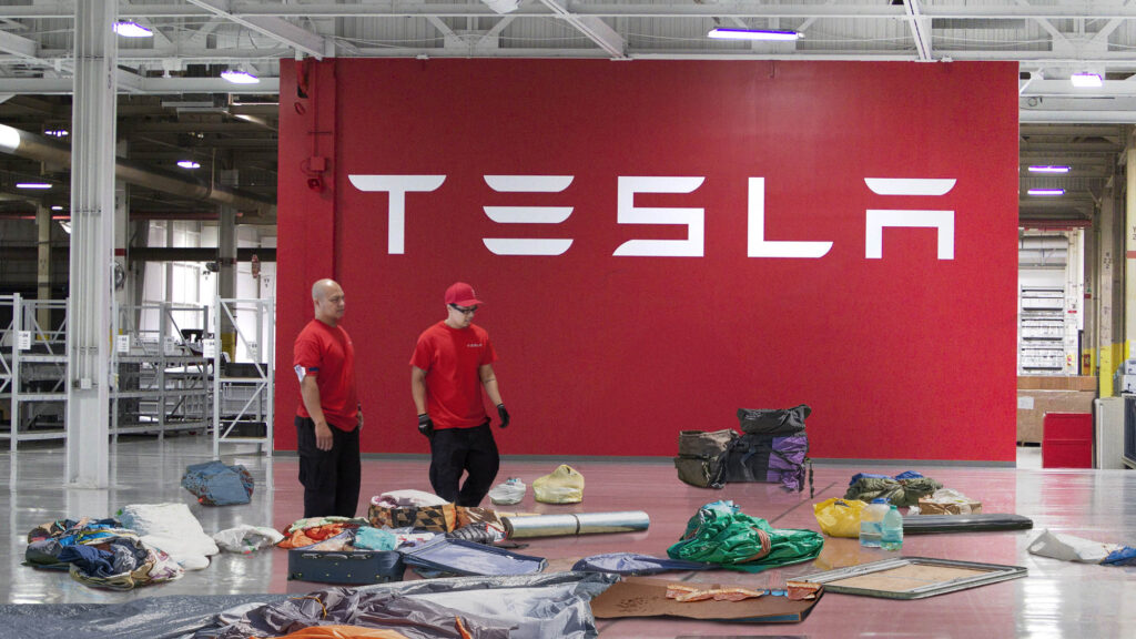 Satire news: tesla employees scramble to make office look like