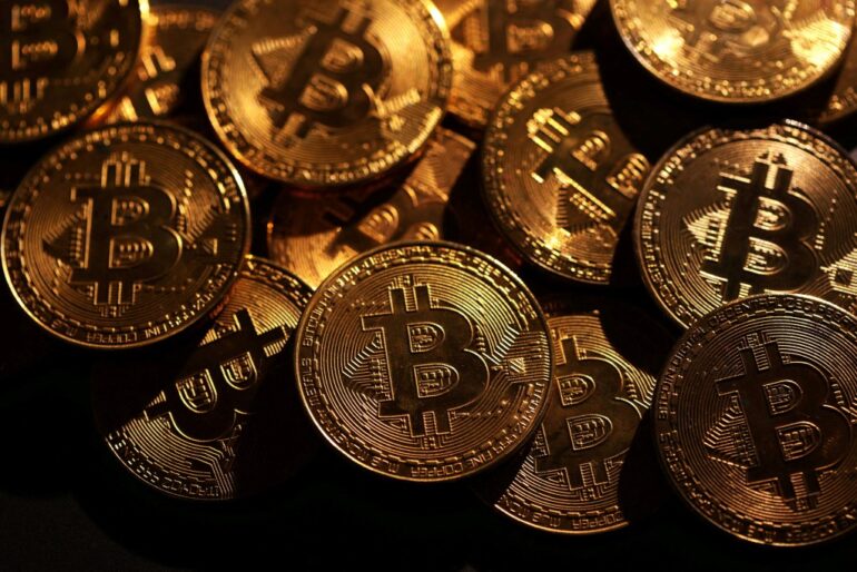 Representations of cryptocurrency Bitcoin.