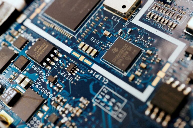 Semiconductor chips are seen on a circuit board