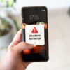Smartphone displaying a new malware alert notification