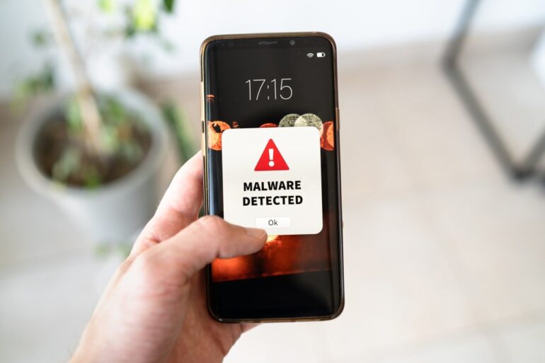 Smartphone displaying a new malware alert notification