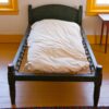 This antique Shaker-style bed uses a rope lattice support.