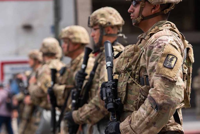 Soldiers in camouflage standing in a line with rifles