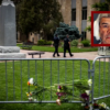 S: (Photo via: FBI) B: olice officers walk past a barricade adorned with flowers outside the Boulder County Courthouse on June 2, 2025 in Boulder, Colorado. A suspect is in custody after reportedly throwing incendiary devices at a group participating in an organized walk to show solidarity with hostages held by Hamas in Gaza. The suspect, an Egyptian citizen who had overstayed his visa, has been charged with a hate crime by the F.B.I. (Photo by Chet Strange/Getty Images)