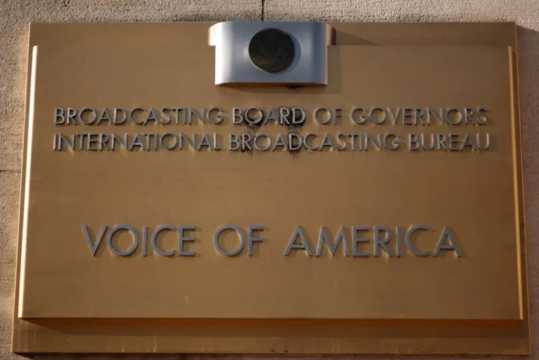WASHINGTON, DC - MARCH 17: The Voice of America (VOA) sign is displayed on its building on March 17, 2025 in Washington, DC. President Donald Trump signed an executive order to eliminate the U.S. Agency for Global Media (USAGM), the parent agency of VOA, and put VOA employees on administrative leave. (Photo by Alex Wong/Getty Images)