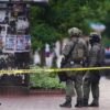 Police officers at a crime scene.