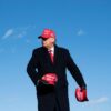 TOPSHOT - US President Donald Trump throws hats to supporters during a Make America Great Again rally at Wilkes-Barre Scranton International Airport November 2, 2020, in Avoca, Pennsylvania. The US presidential campaign enters its final day Monday with a last-minute scramble for votes by Donald Trump and Joe Biden, drawing to a close an extraordinary race that has put a pandemic-stricken country on edge. (Photo by Brendan Smialowski / AFP) (Photo by BRENDAN SMIALOWSKI/AFP via Getty Images)