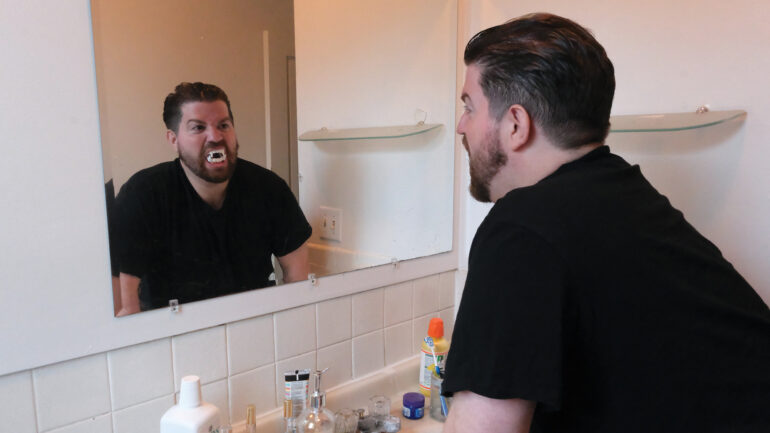 Satire news: proactive man starts working on dracula impression early