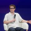 Mark Zuckerberg speaking at a conference.