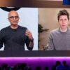Satya Nadella and Sam Altman on a large screen.