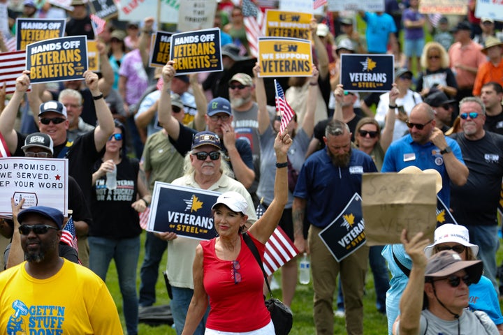 People gather June 6 on the National Mall in Washington, D.C., at the Unite for Veterans, Unite for America Rally to support veterans' rights and oppose policies of President Donald Trump.
