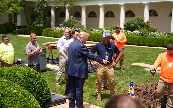 Trump looks over a construction project in the Rose Garden of the White House on June 9, 2025.