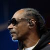 Close-up profile view of Snoop Dogg.
