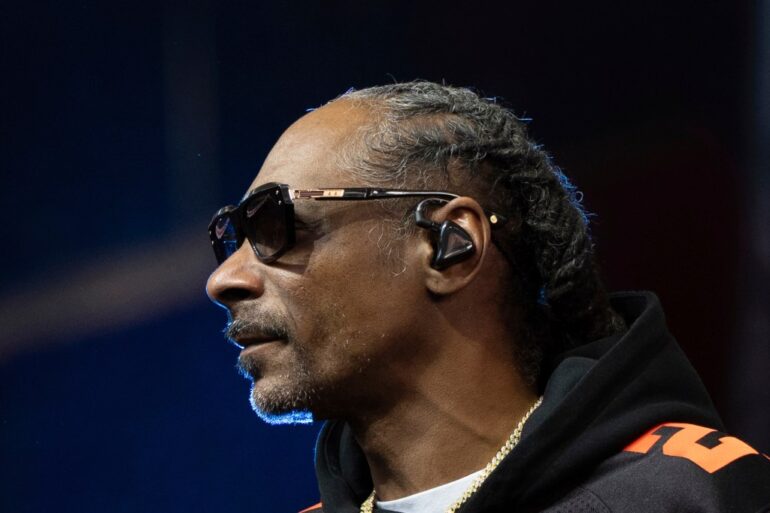 Close-up profile view of Snoop Dogg.