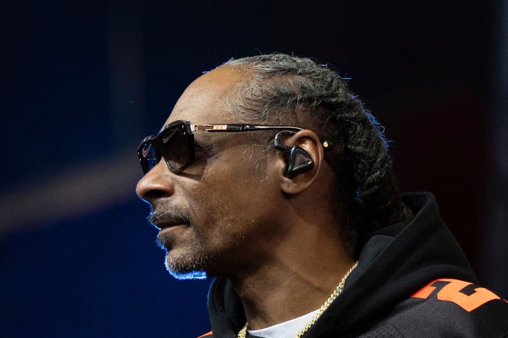 Close-up profile view of Snoop Dogg.
