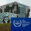 International Criminal Court building with sign in foreground.