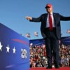 US President Donald Trump gestures as he steps on stage to deliver remarks at the Salute to America Celebration at the Iowa State Fairgrounds in Des Moines on July 3, 2025. (Photo by ANDREW CABALLERO-REYNOLDS / AFP) (Photo by ANDREW CABALLERO-REYNOLDS/AFP via Getty Images)