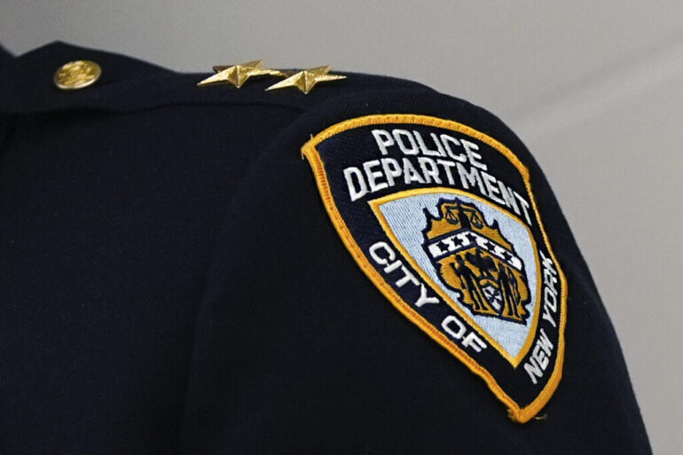 Politics: father of slain nypd officer suffers stroke after hearing