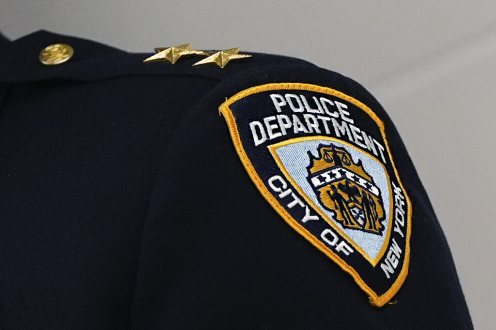 Politics: father of slain nypd officer suffers stroke after hearing