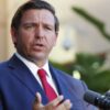 Politics: florida city reverses course, reinstates policy to work with