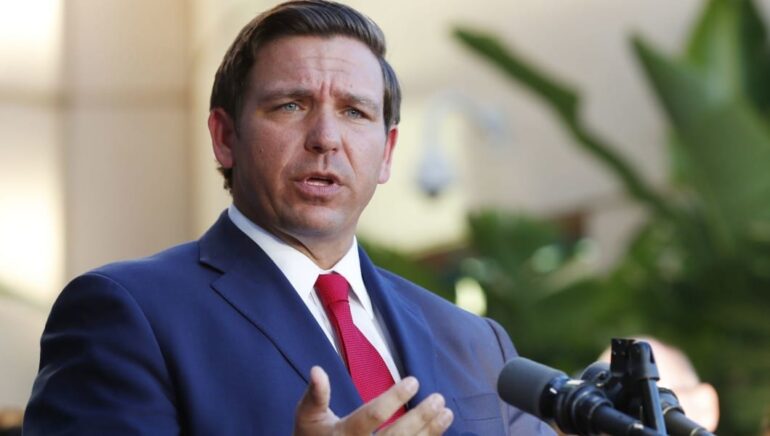 Politics: florida city reverses course, reinstates policy to work with
