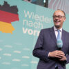 Politics: german pm admits europe has been a ‘free rider’