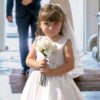 Satire news: completely charmless flower girl walks directly down aisle