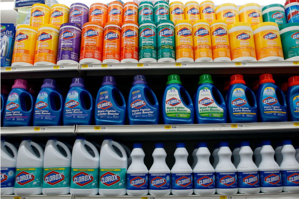 Grocery store shelves stocked with Clorox cleaning products.