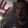 Tony Stark holding the Infinity Stones in his armored right hand in Avengers: Endgame