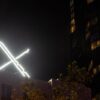 'X' logo is seen on the top of the headquarters of the messaging platform X, formerly known as Twitter, in downtown San Francisco, California, U.S., July 30, 2023. REUTERS/Carlos Barria/File Photo
