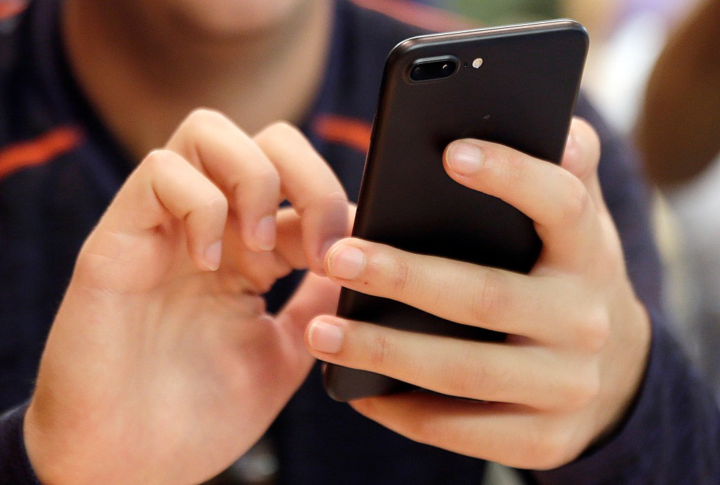 Person using a smartphone.