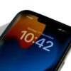 Close-up of an iPhone 13 Pro Max displaying low battery.