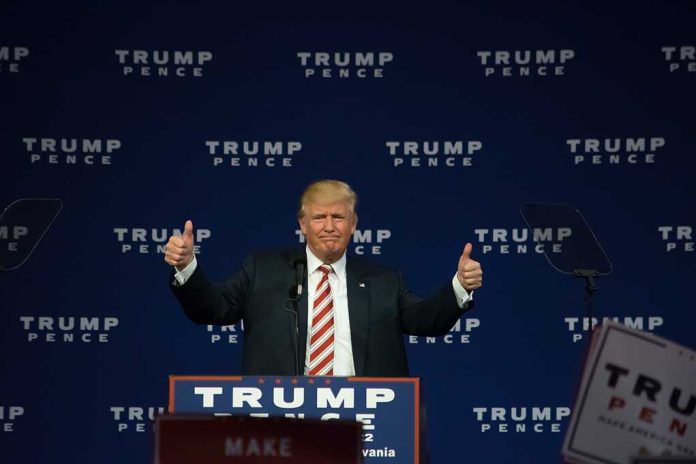 Man giving thumbs up at Trump Pence rally